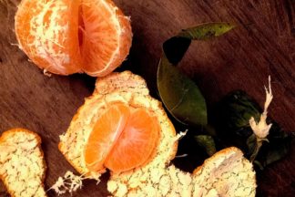 photo: tangerine, peeled, with leaves