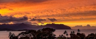 photo: sunset over Coconut Island and the Ko'olau range