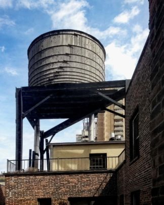 photo: a rooftop water tower (AKA 'tank') in New York City