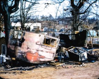 photo art: burnt trailer home in Kevil, Kentucky in the 1950s